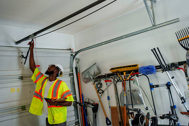 Professional Garage Door Panel Replacement technician working in Moodys, OK